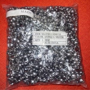 Necklaces Mardi Gras beads Gasprilla skull and cross bones molded plastic silver